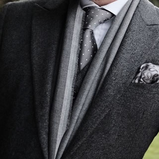 Introducing Black, Bringing Grey Suits to Life